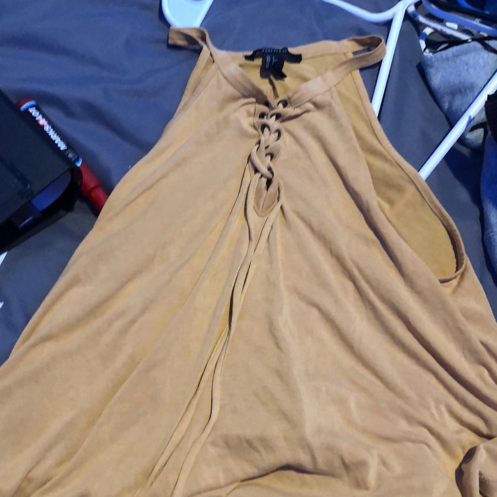Yellow sleeveless shirt